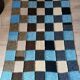 Hand knitted patchwork plaid