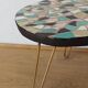 Unusual coffee table on three legs