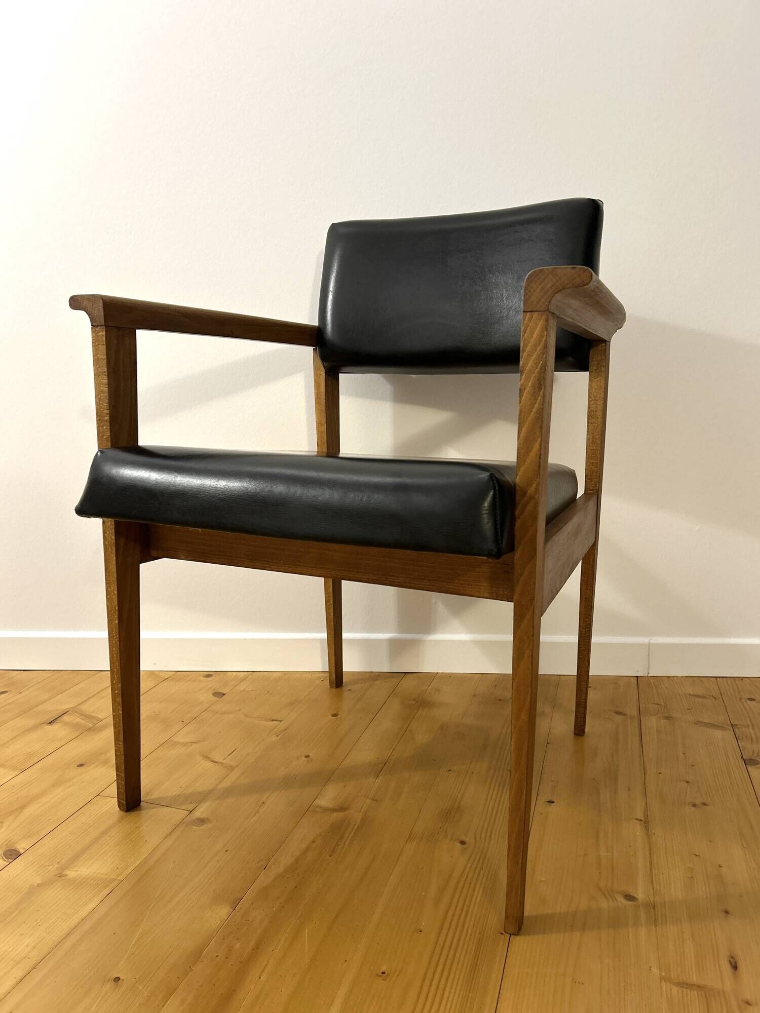 Mid-Century faux leather and wood armchair