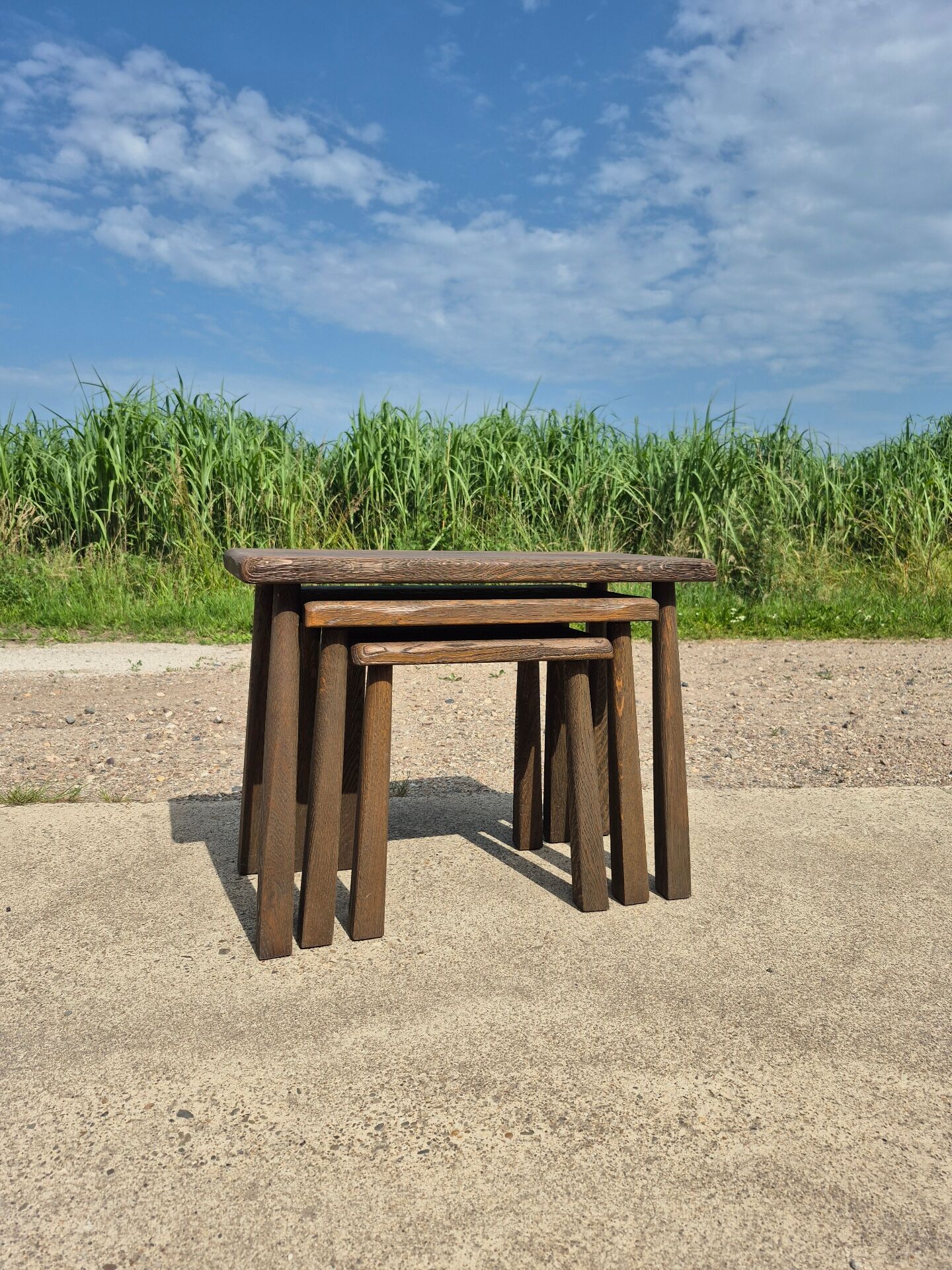 Set 3 nesting tables oak high legs 1970s dark brutalist
