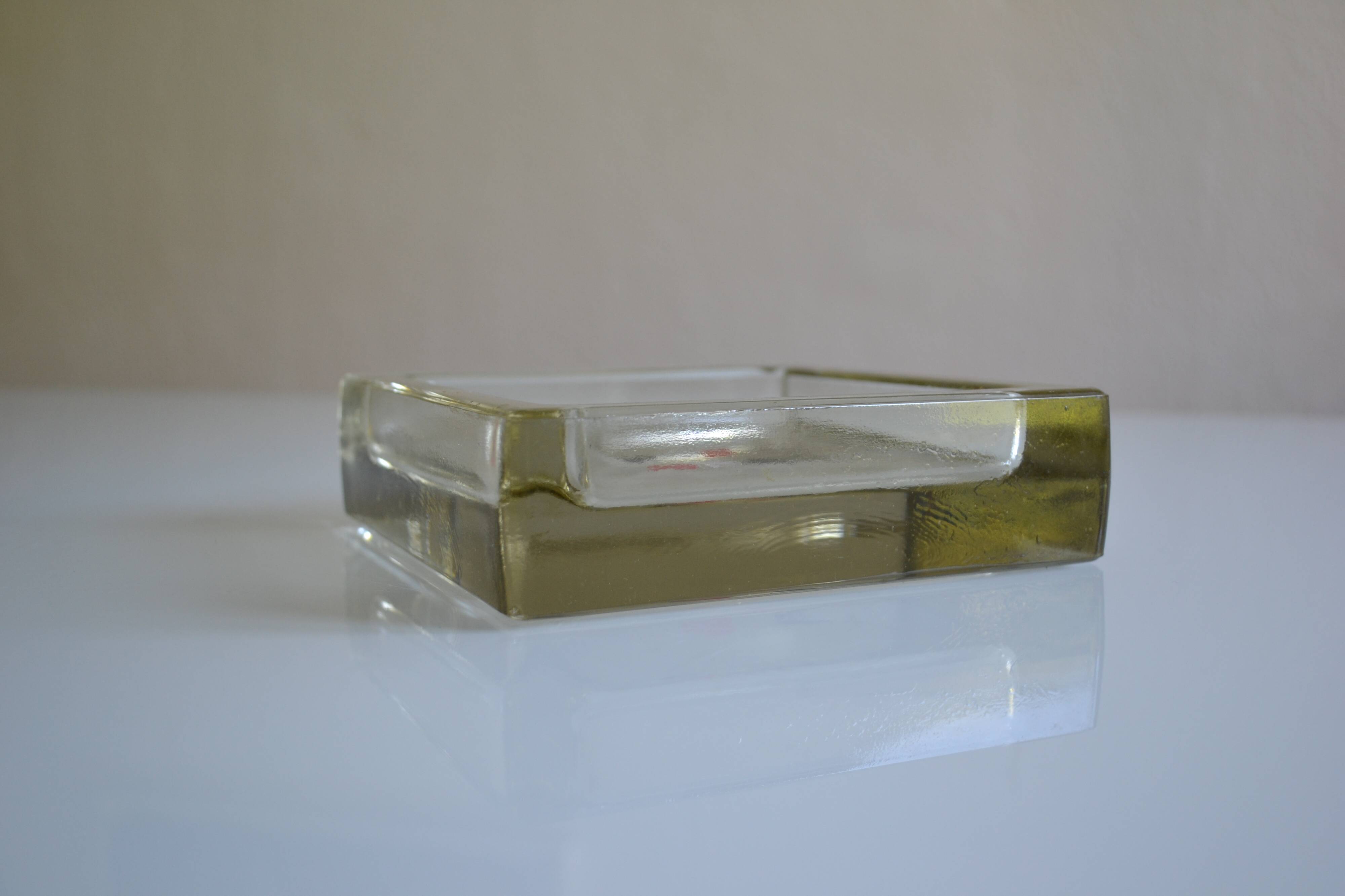 glass block pockets in the 4 colours of the card game