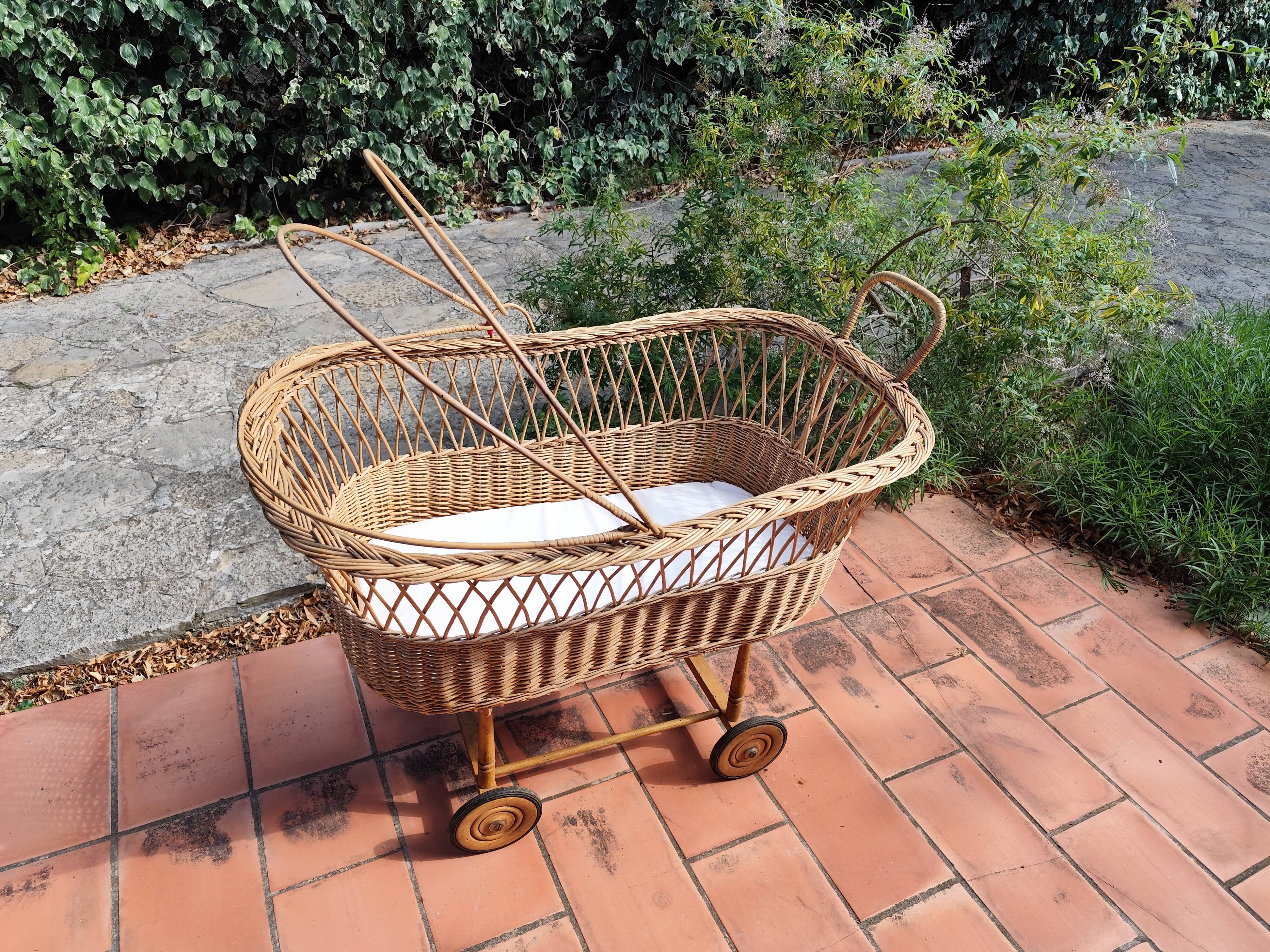 Vintage rattan Alsatian doll cradle bassinet