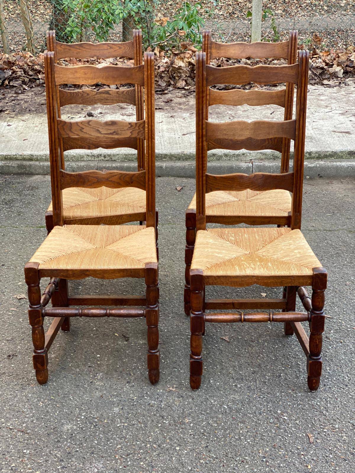 4 solid wood chairs with straw seats and high backs, 108cm.