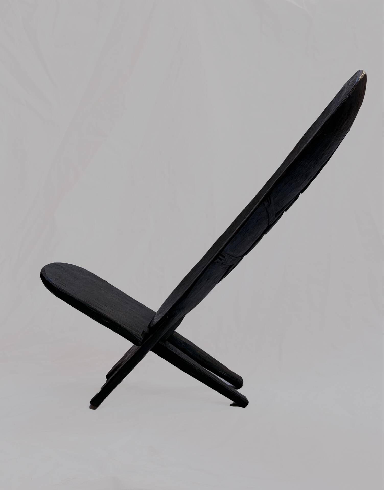 African wooden talking chair – Handmade armchair from Burkina Faso