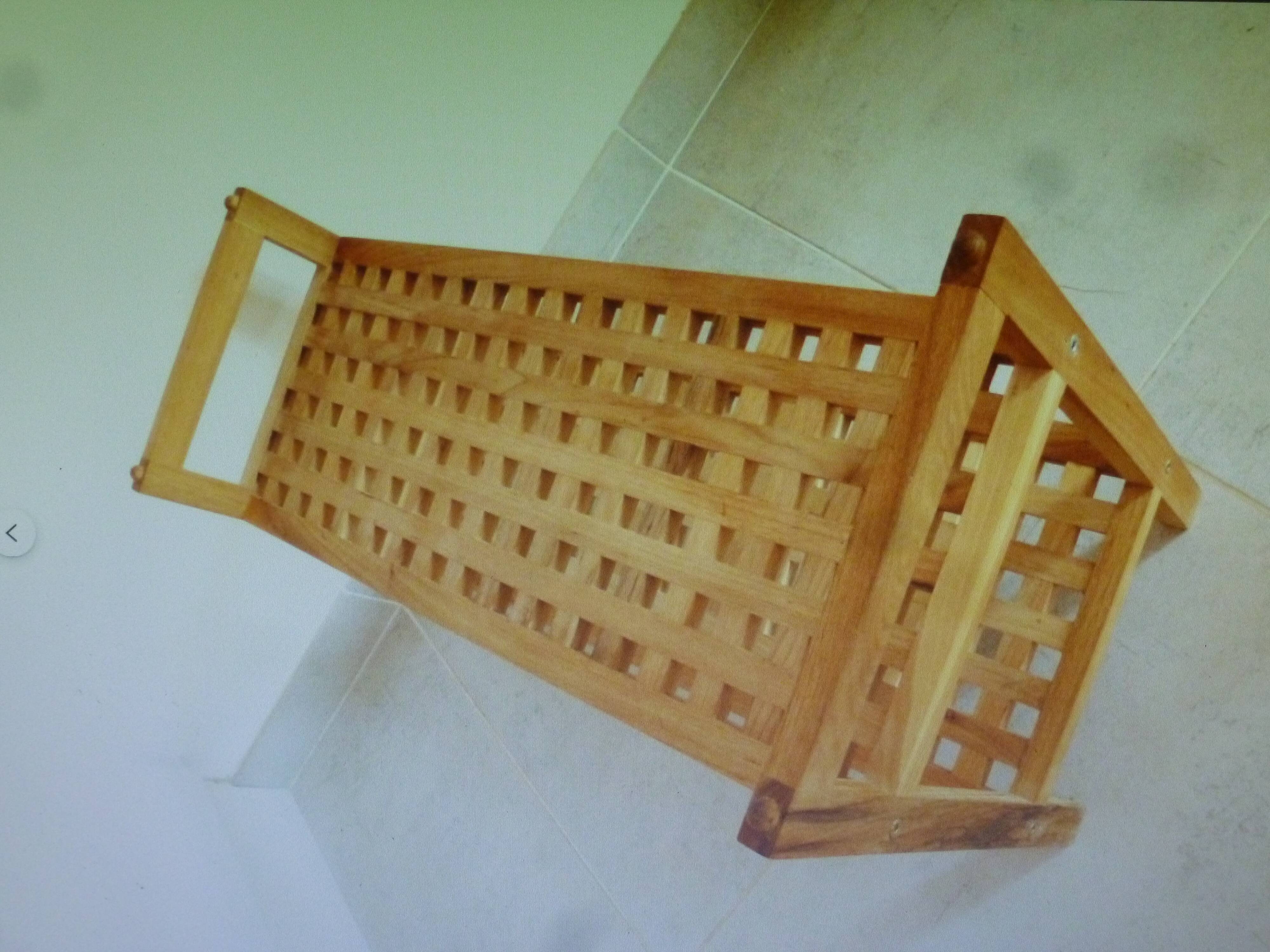 Wooden coffee table with openwork shelves and garden plant holder.