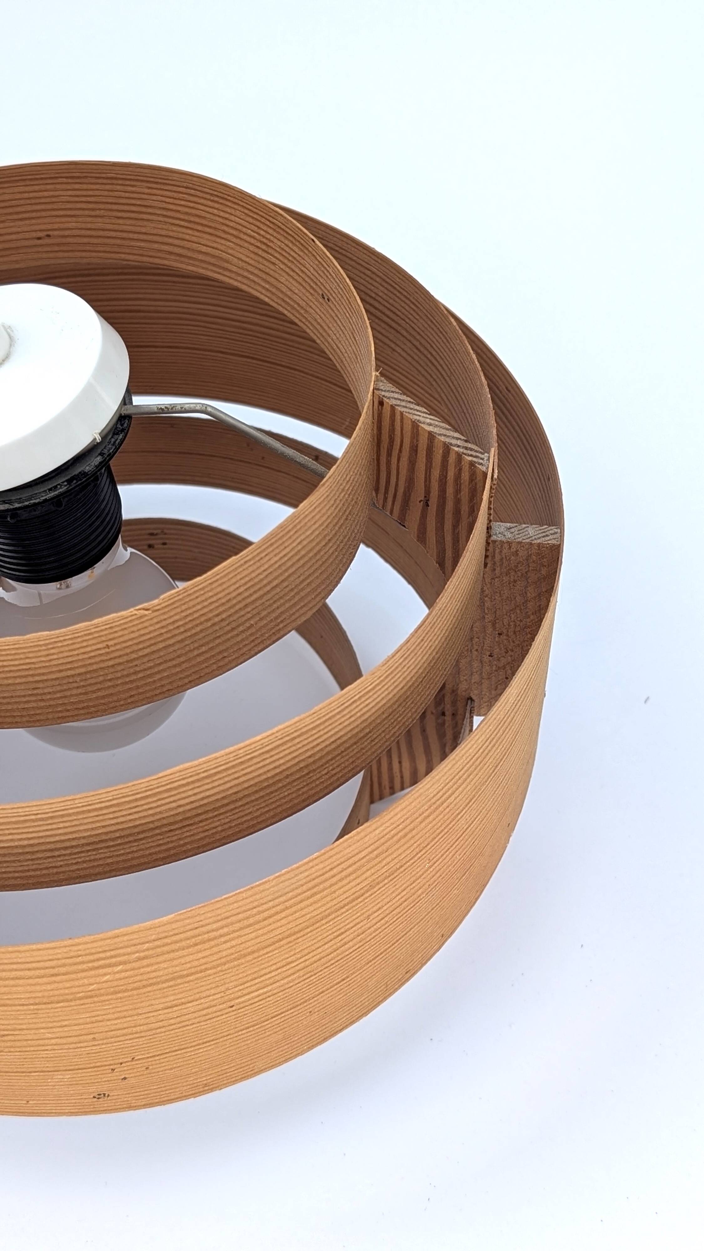 Suspension in pine veneer by Hans-Agne Jakobsson