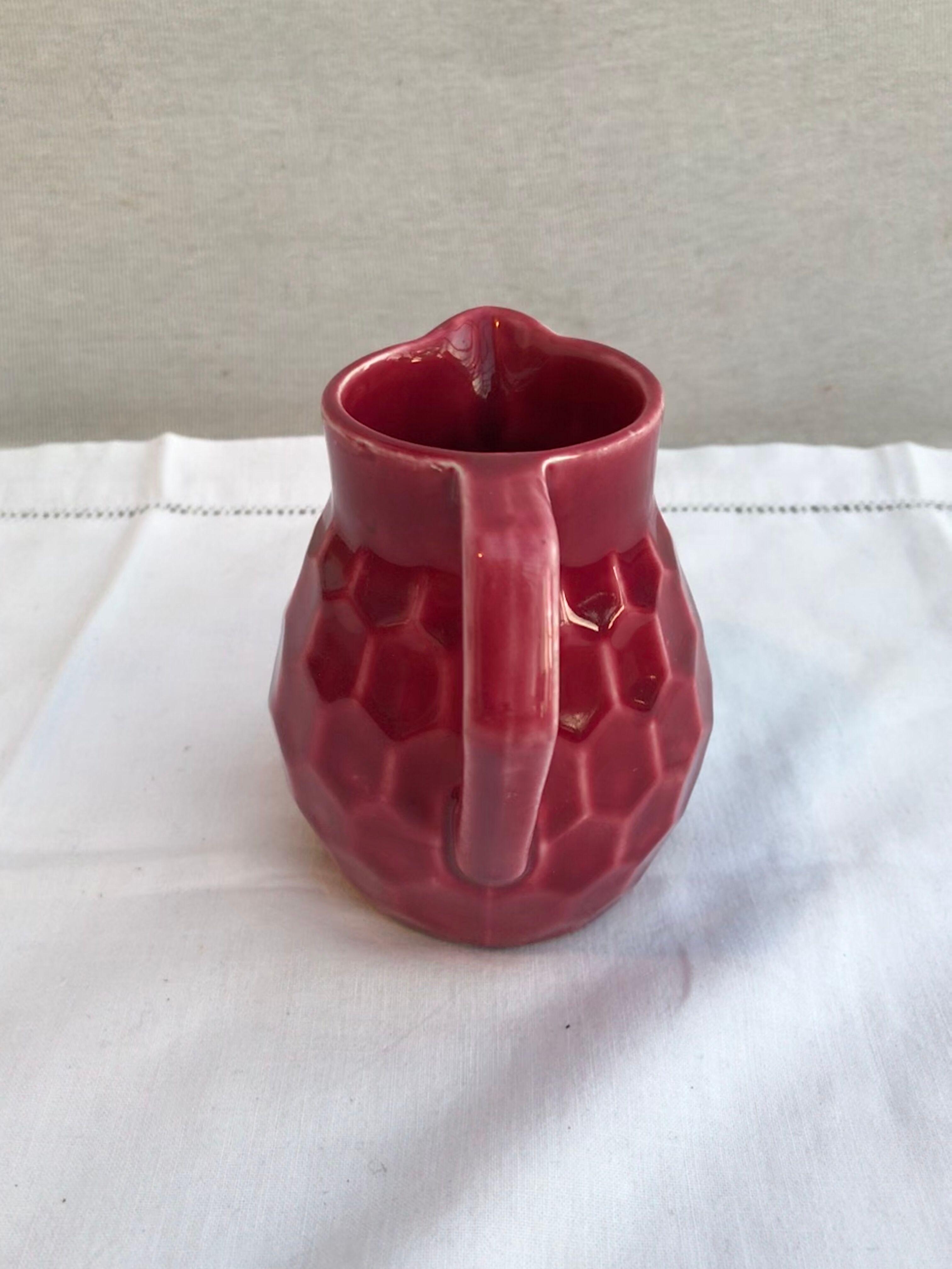 Former art deco red ceramics pitcher