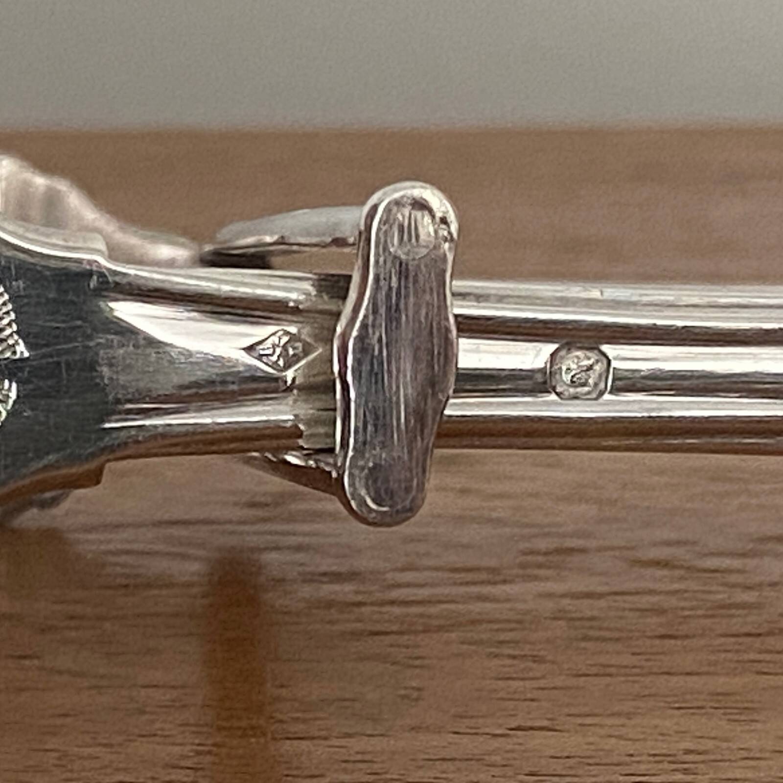 Silver asparagus tongs with Minerva hallmark, 19th century