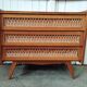 Commode vintage rotin pieds compas