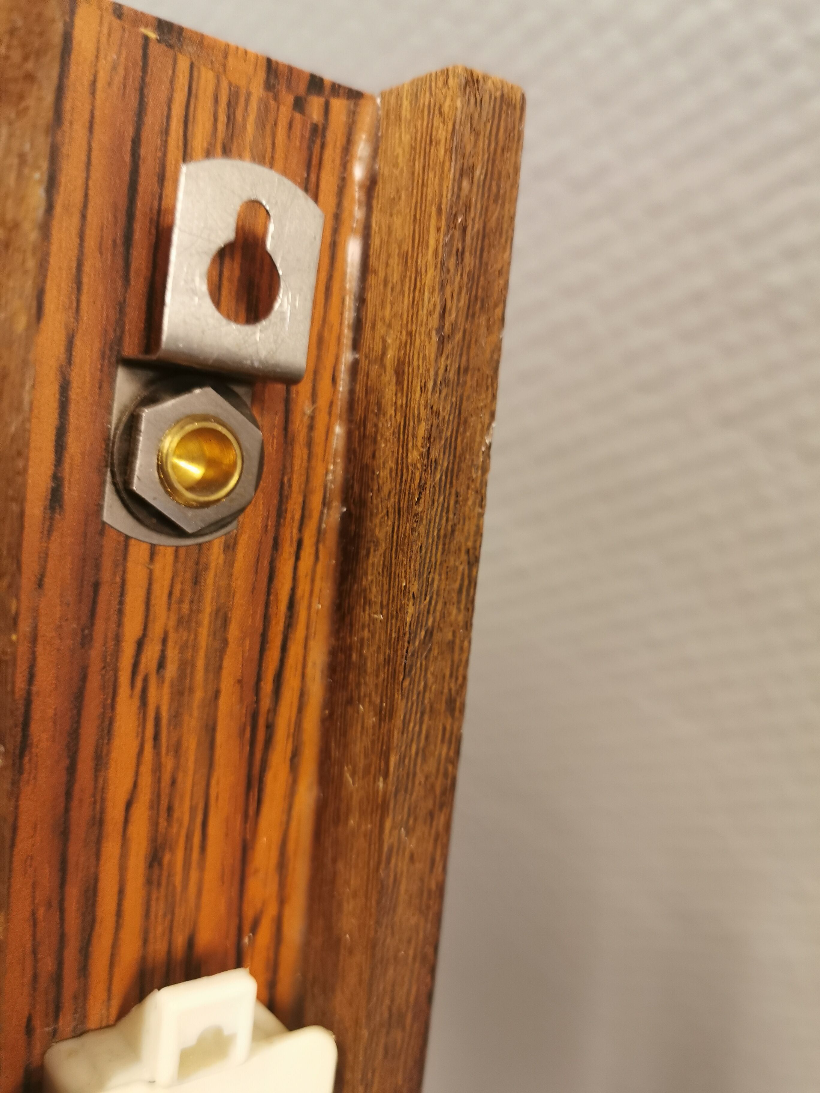 Wall light in rosewood with bobble glass ball shade.