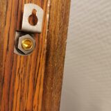 Wall light in rosewood with bobble glass ball shade.