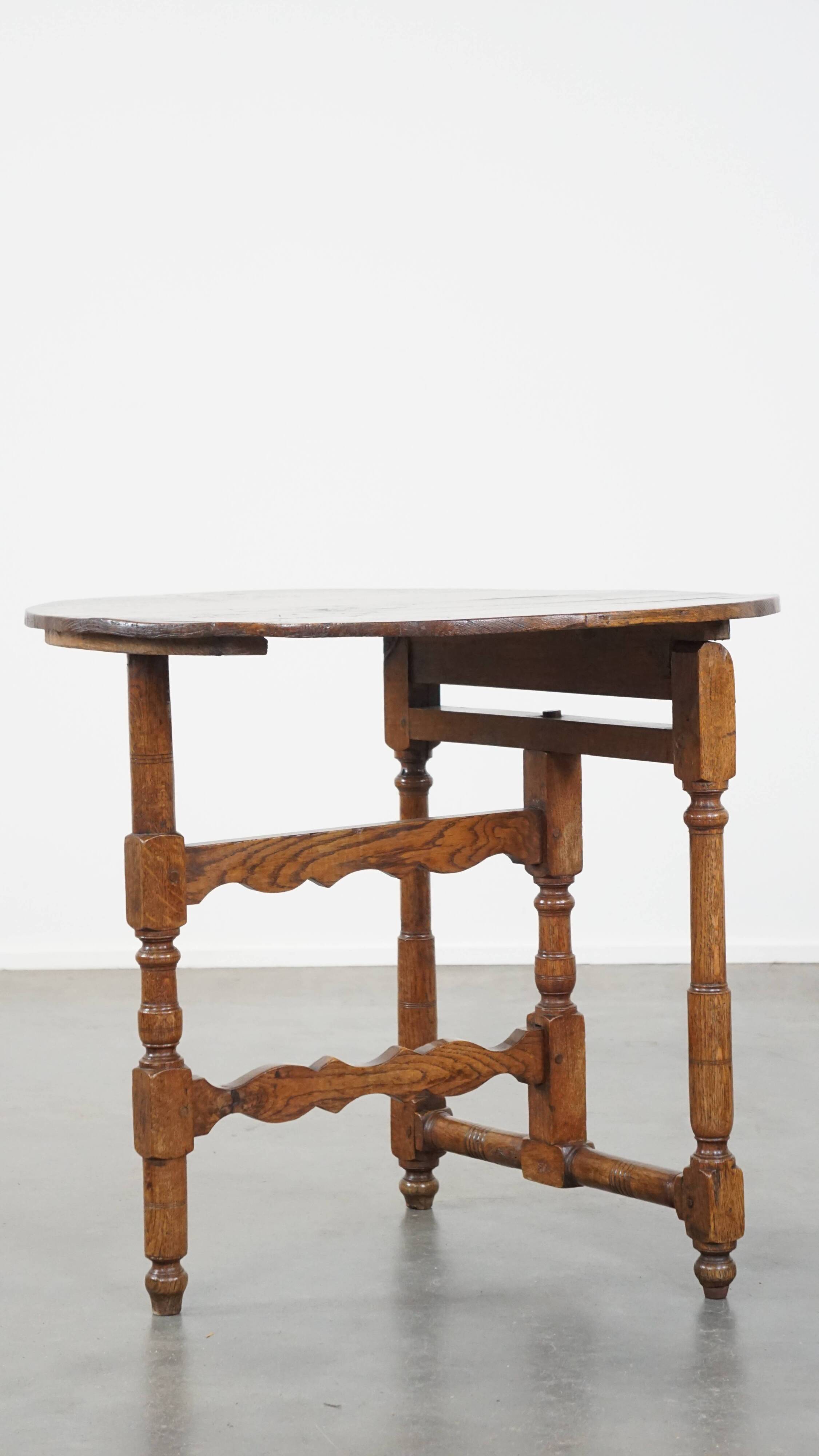Round, folding antique 18th-century French wine/country table