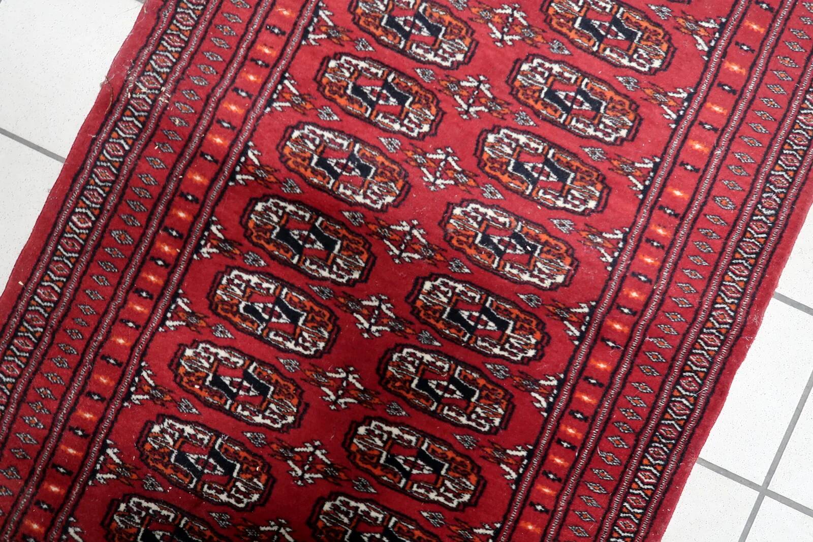 Handmade vintage Uzbek Bukhara rug 86cm x 125cm, 1960s