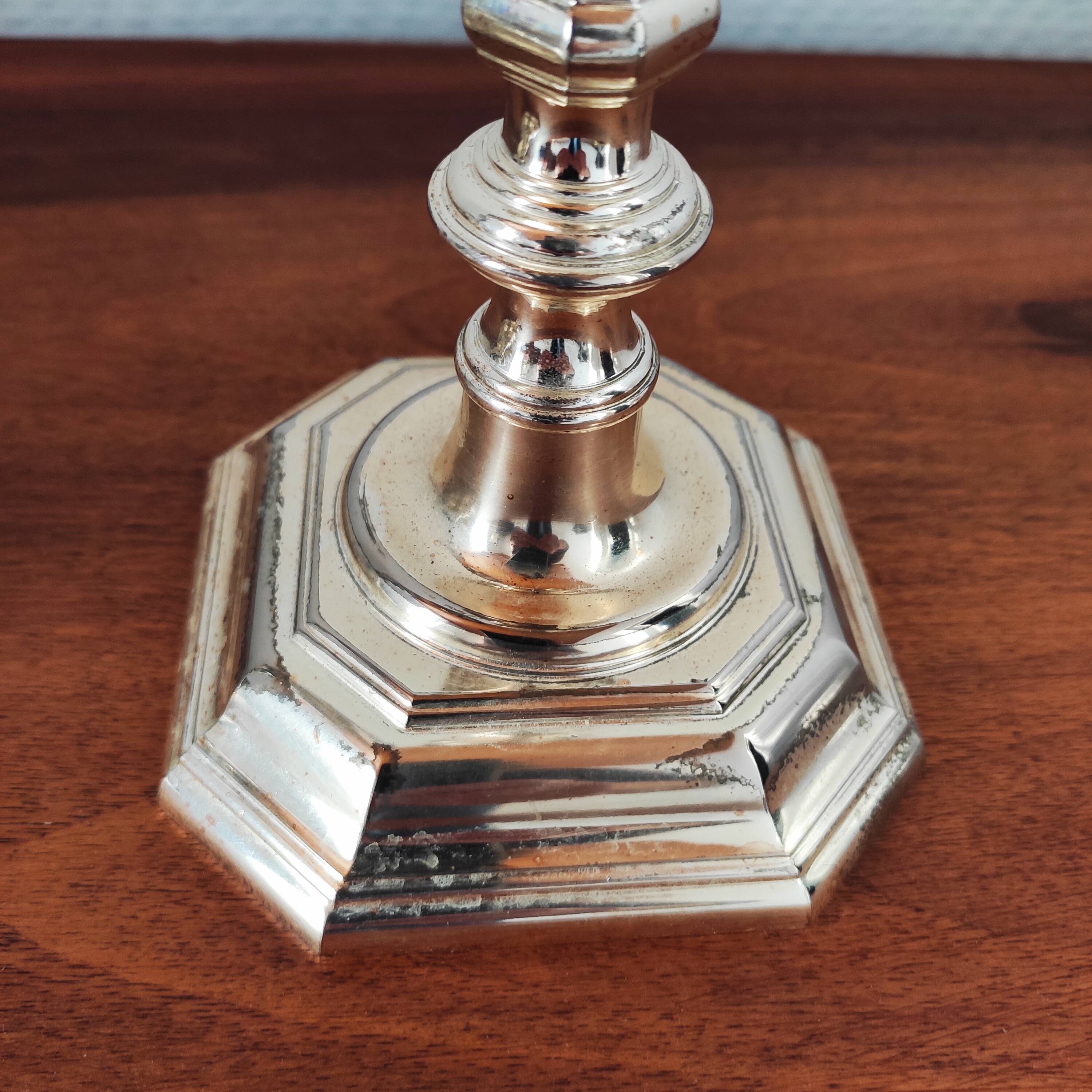 Antique silver-plated metal candlestick and candle holders