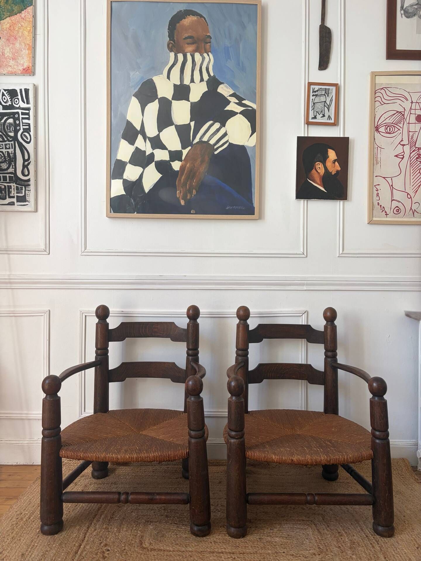 Paire de fauteuils en bois et paille  Charles Dudouyt 