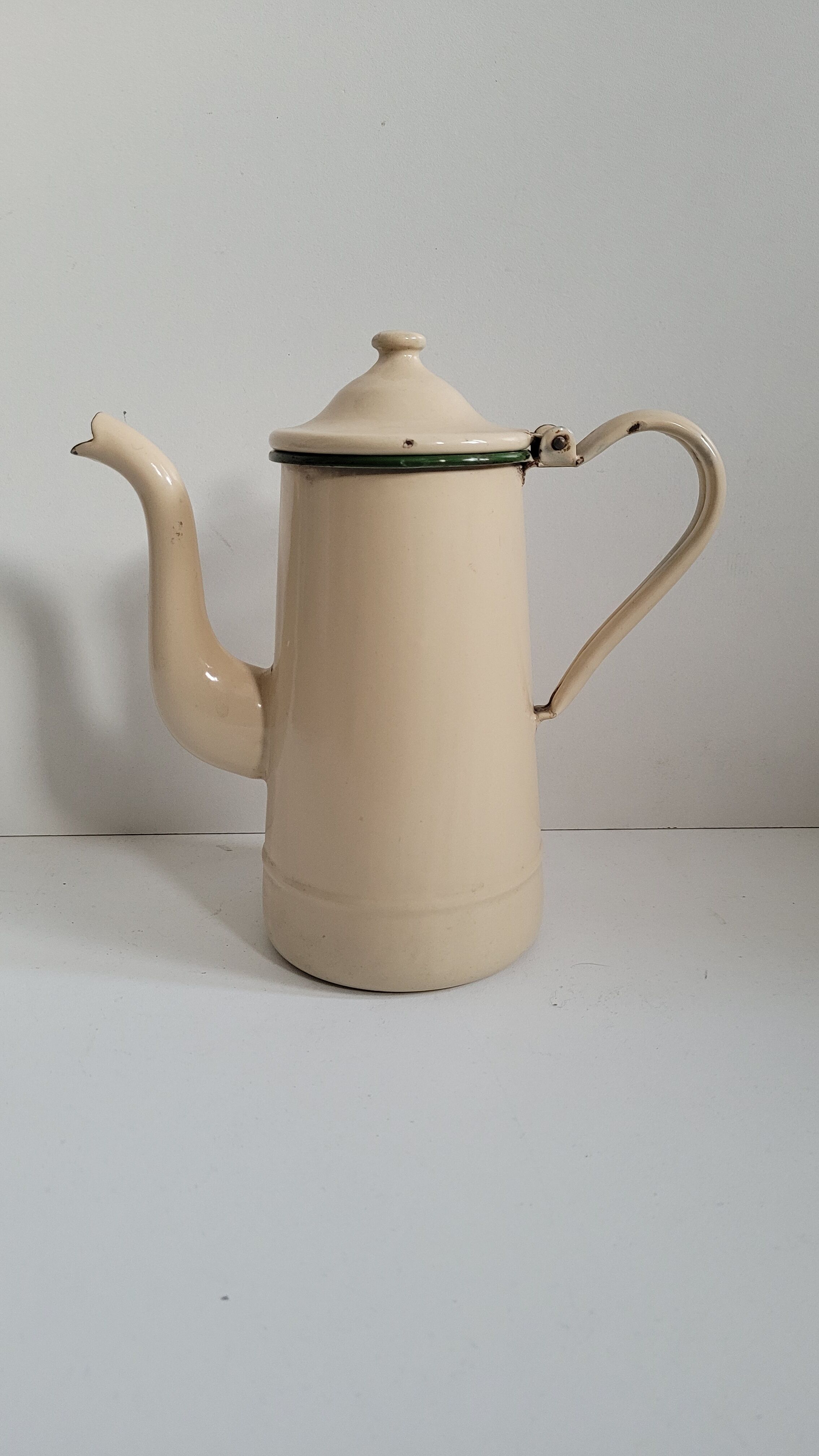 Beige enamel coffee maker