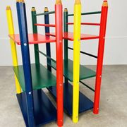 Pair of pencil-style shelves by Pierre Sala for children.