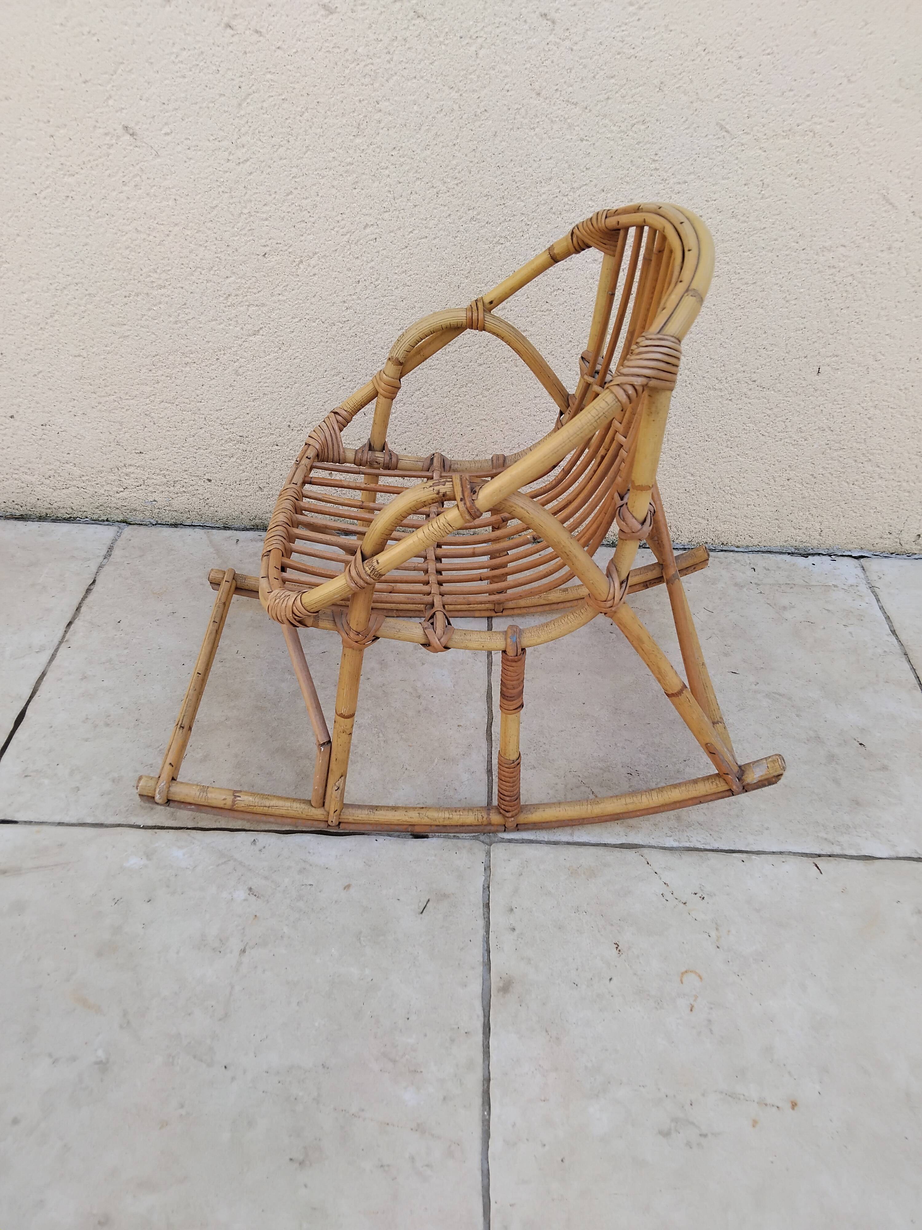 Vintage children's rattan rocking chair