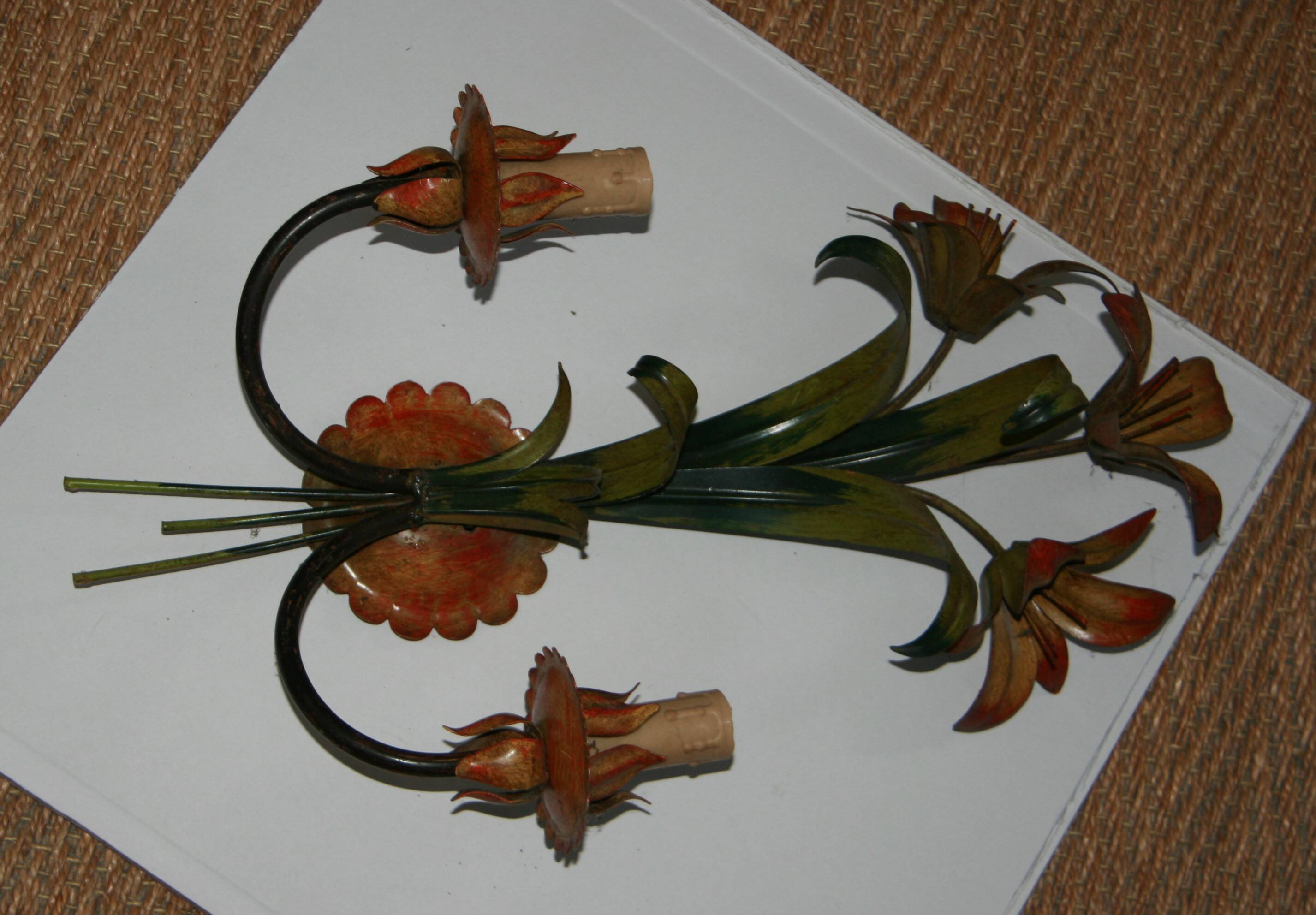 Pair of vintage floral wall sconces in Italian Florentine style metal.