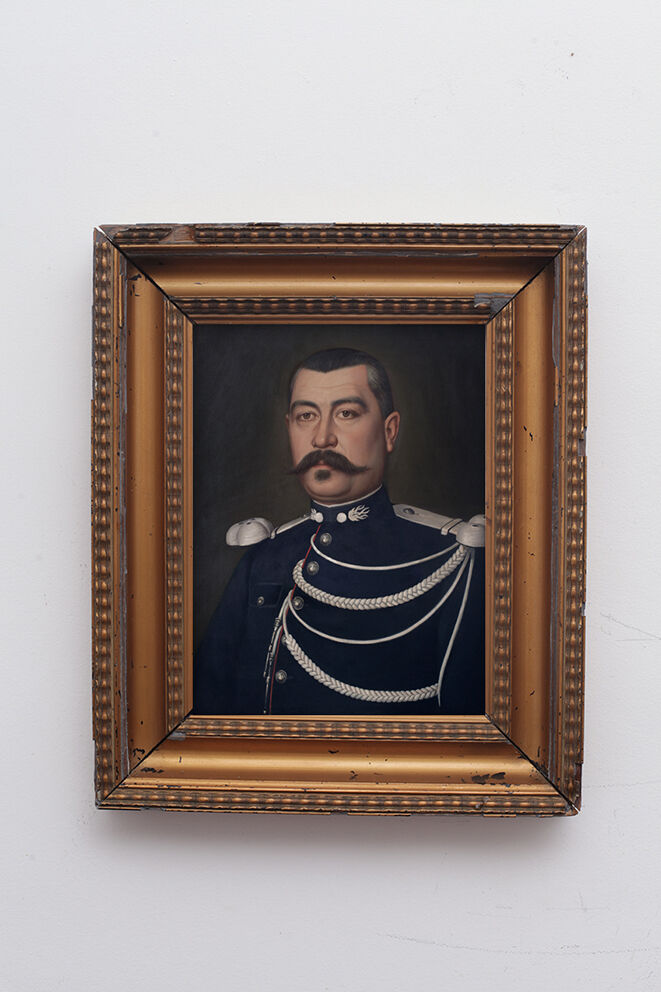 Portrait old man in gold frame