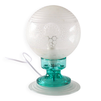 Frosted globe lamp and turquoise glass