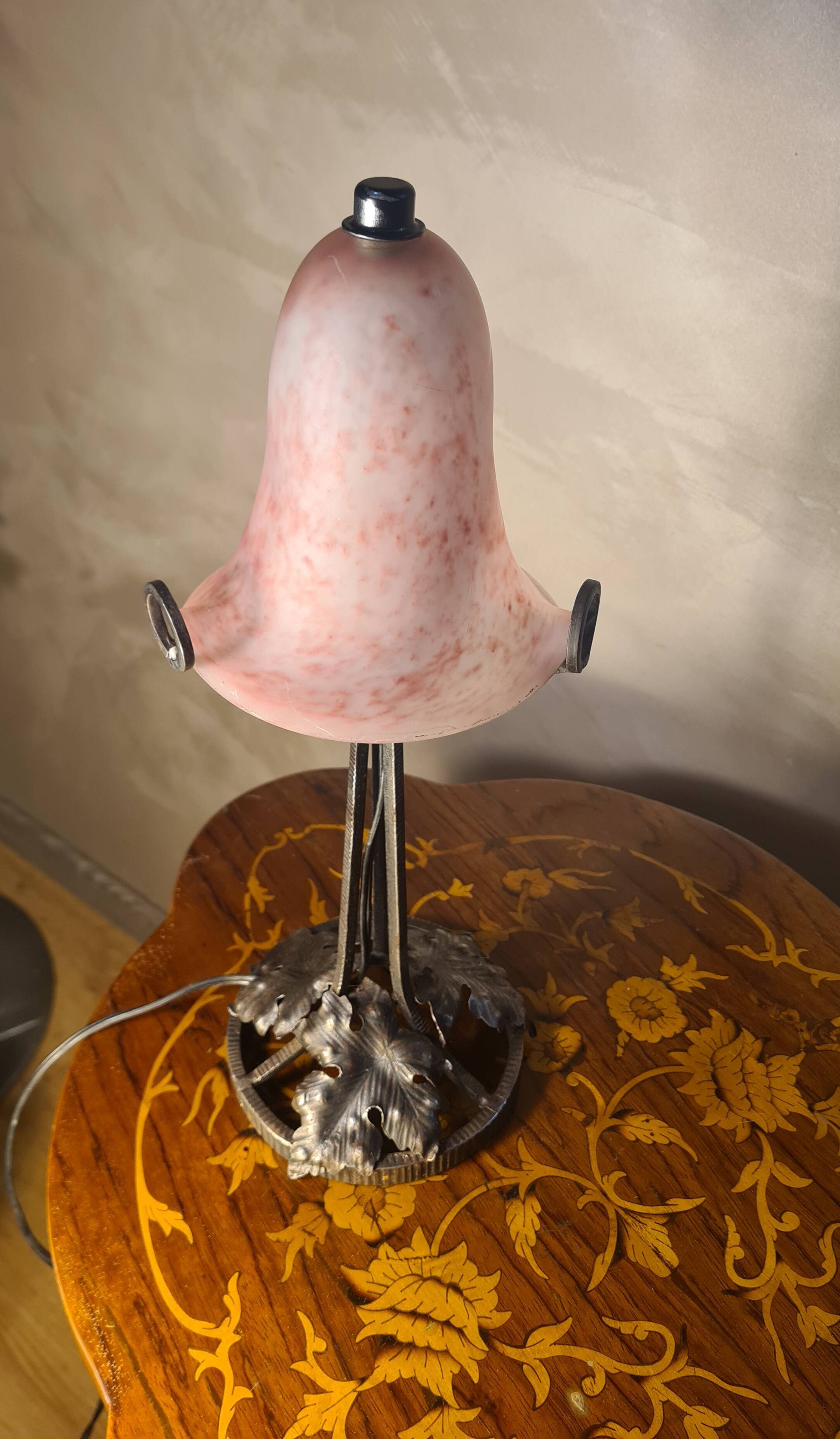 Antique wrought iron floor lamp, 1900, with a glass shade, 40x15.