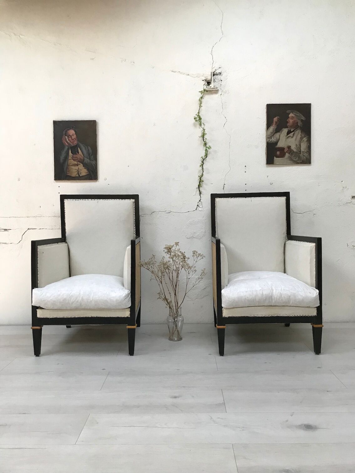 Pair of blackened wooden armchairs