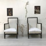 Paire de fauteuils en bois noirci