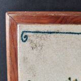 Vintage ceramic trivet – stylised floral design