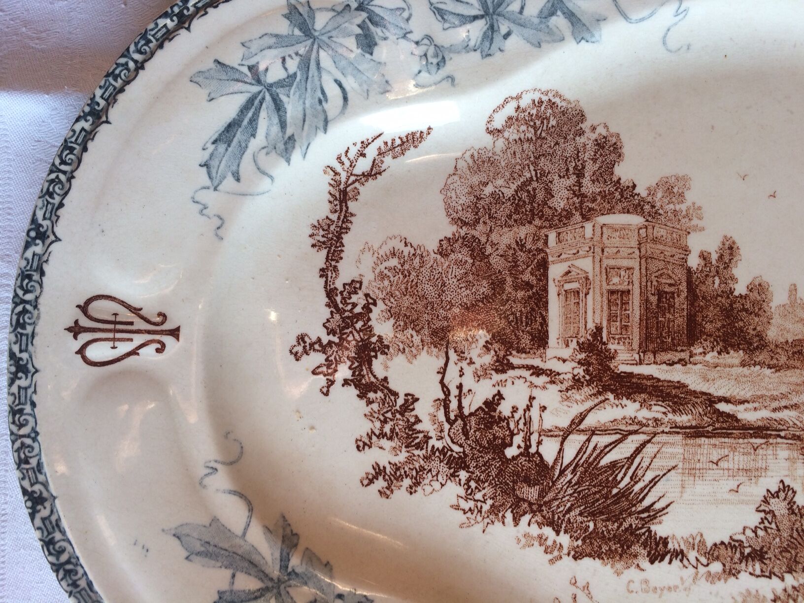 Ancient dish made of earthenware from the factory of Choisy the King