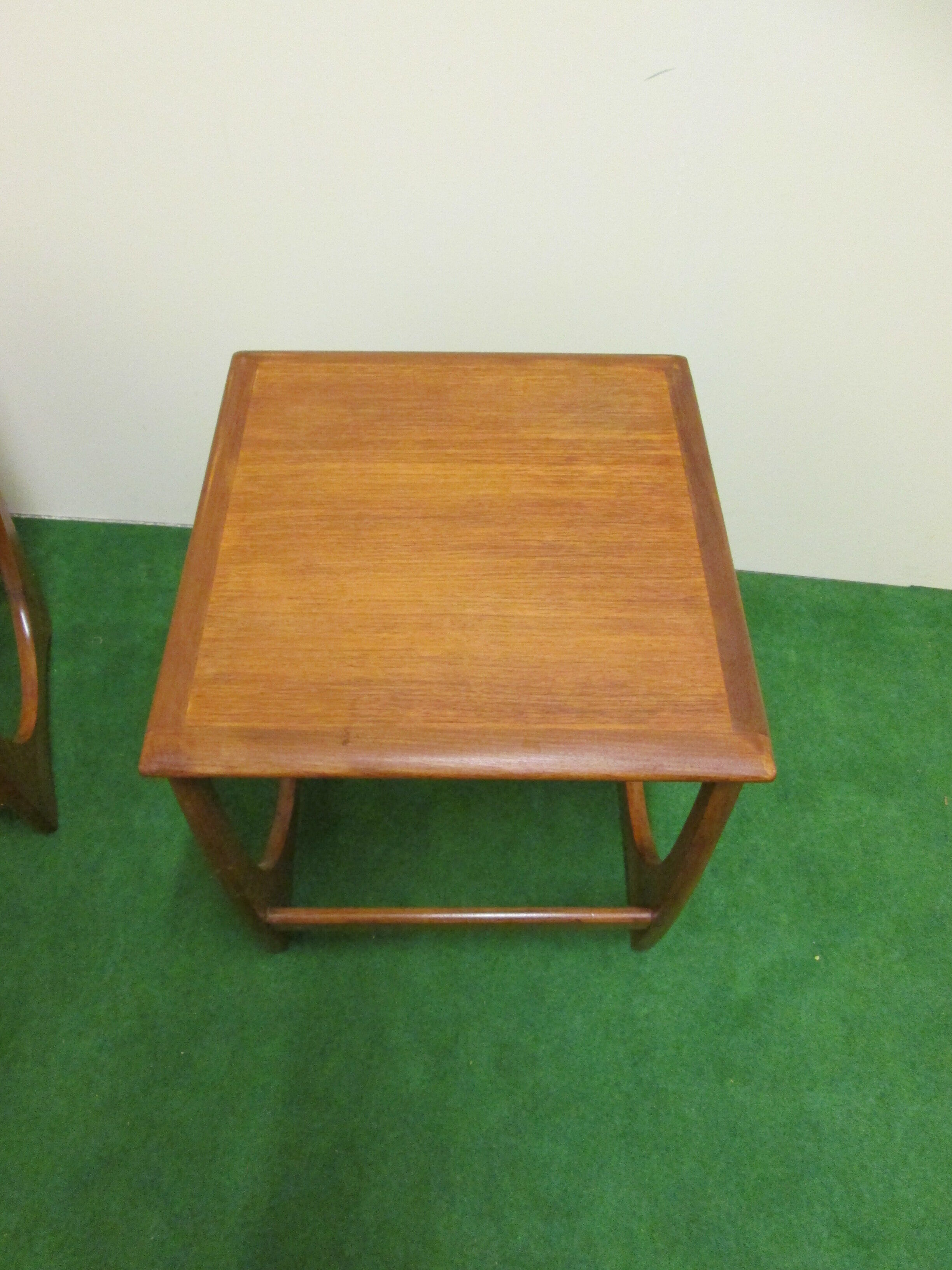 Nesting coffee tables in teak