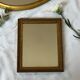 Miroir vintage doré en bois