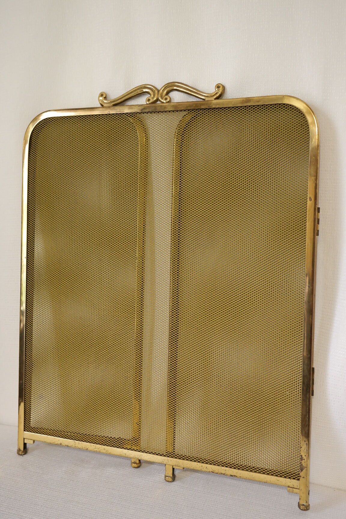 Vintage brass chimney firewall