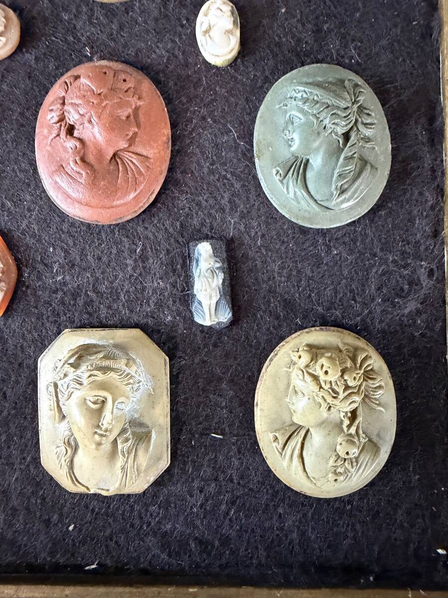 Collection of cameos and intaglios, shells and lava stones, around 1900.
