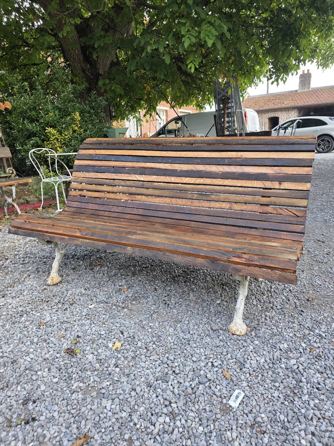 Cast iron and oak slatted garden bench