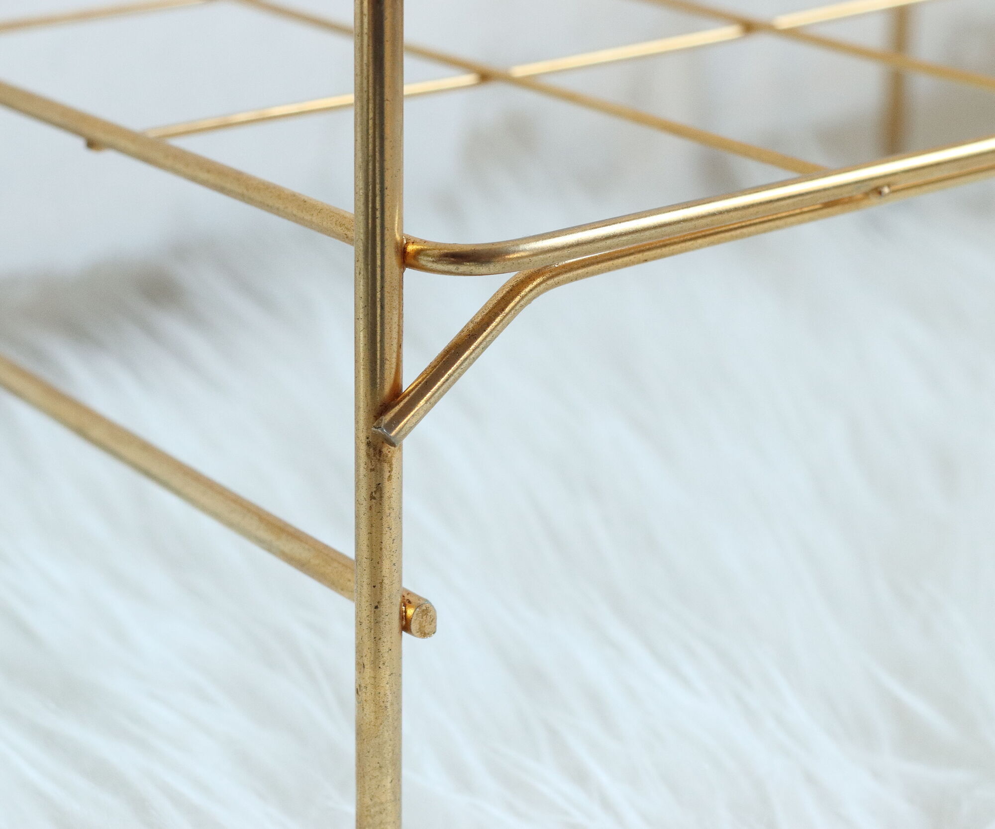 Side table in gilded brass