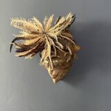 Tribal mask with feather head-decoration