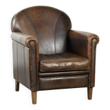 Armchair / lounge chair made of sheepskin leather with characterful patina