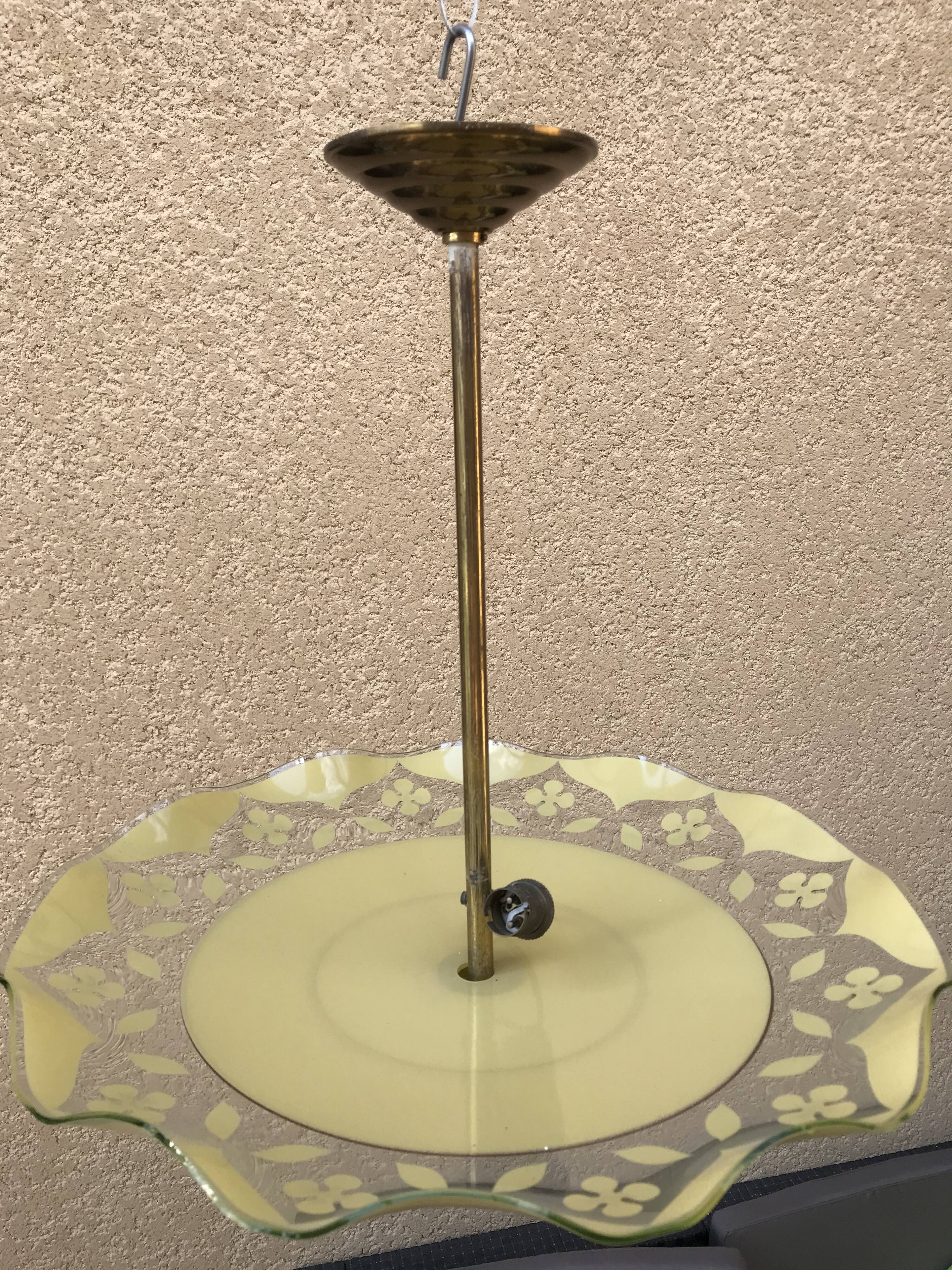 Brass and yellow glass hanging lamp