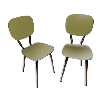 Pair of green formica chairs