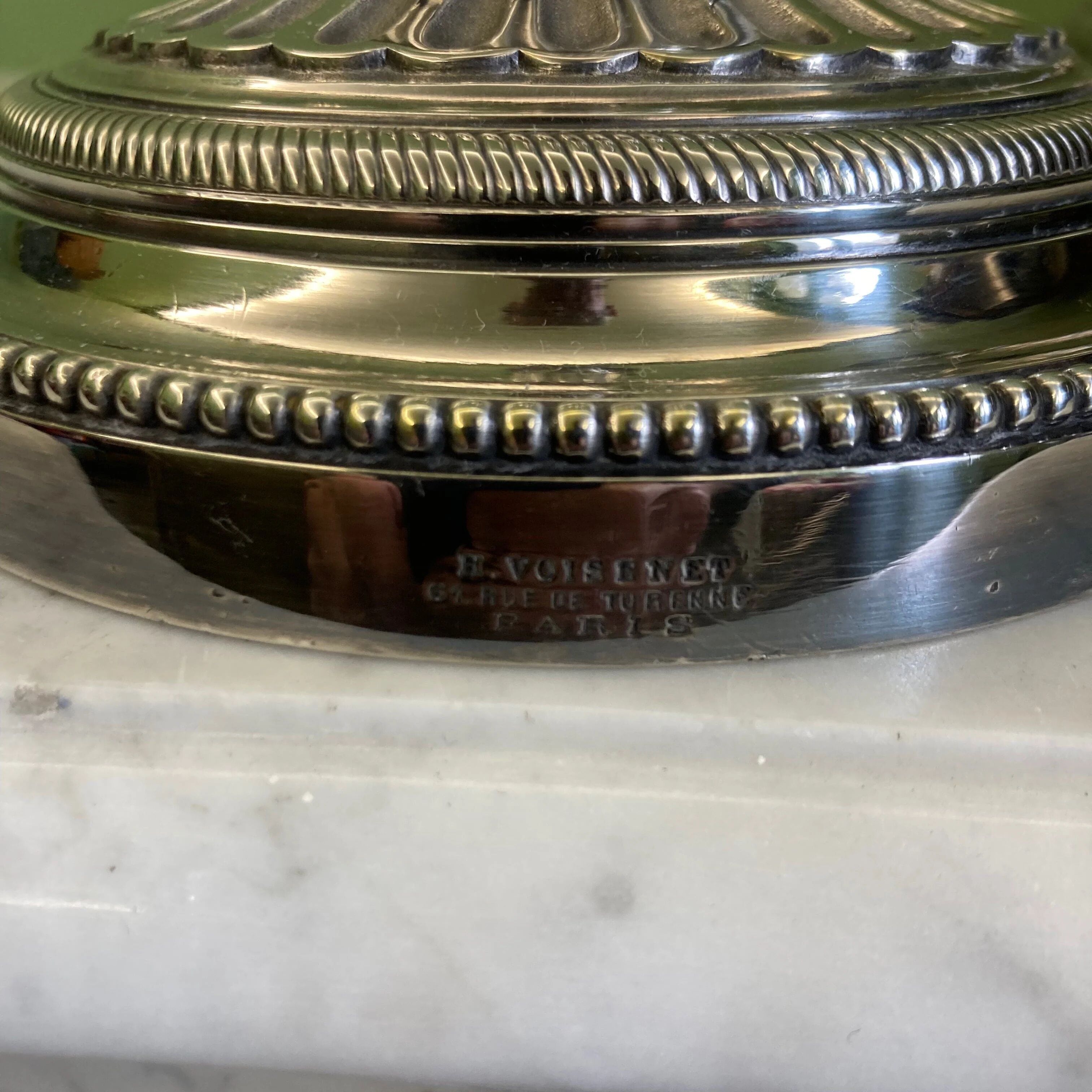 Pair of silvered bronze candlesticks from the 19th century in Louis XVI style signed Voisenet.