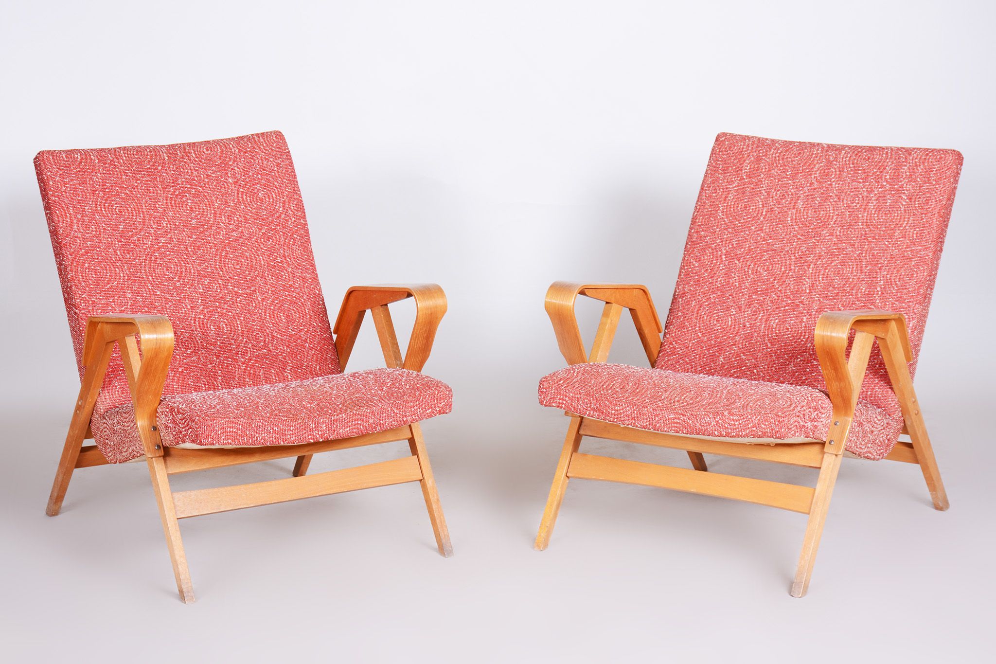 Pair of salmon midcentury armchairs, made by Tatra pravenec, 1950s czechia