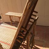 Chair with foot rest long rattan sliding removable armrests