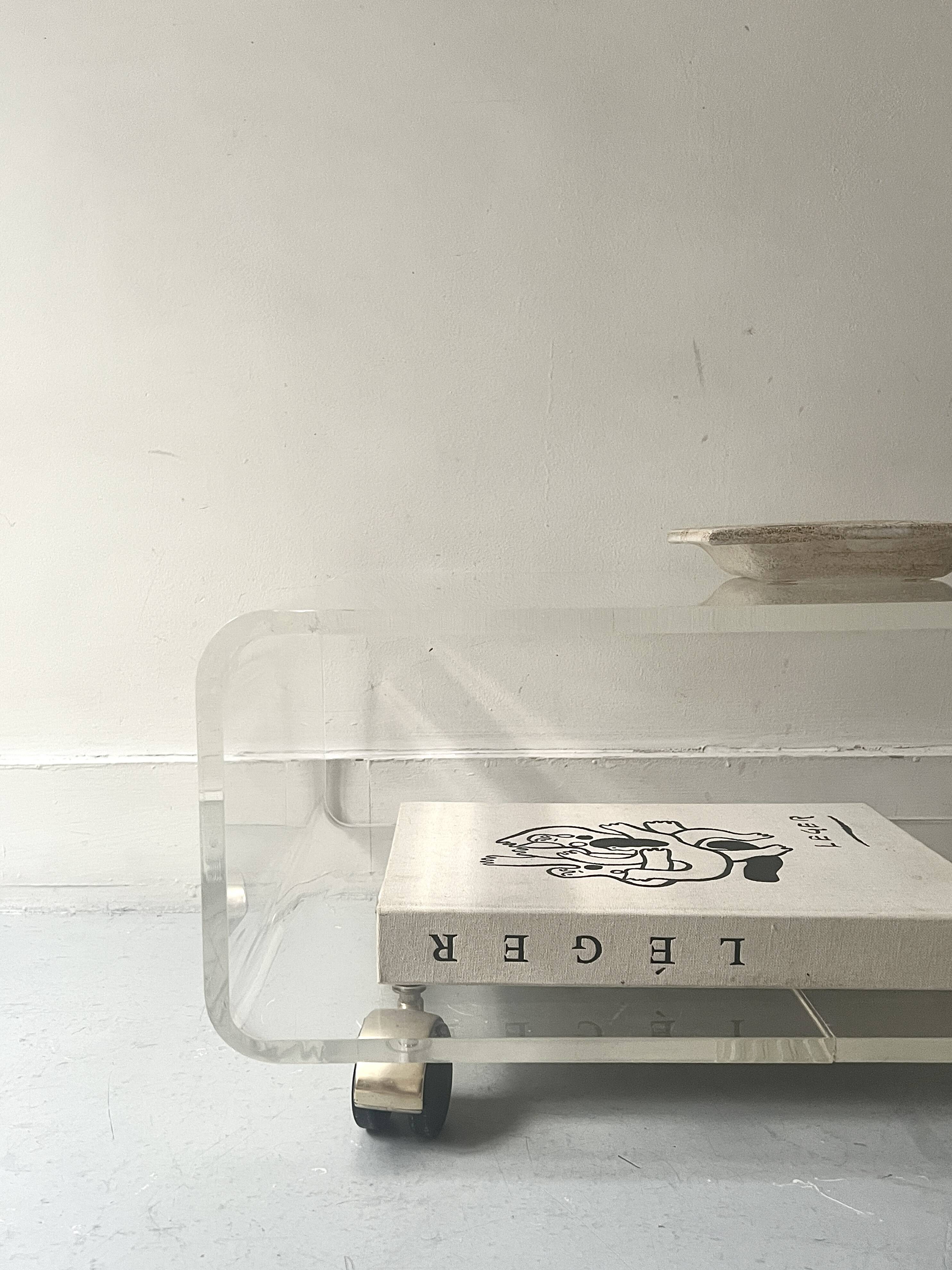 Transparent plexiglass coffee table by Roche Bobois, 1970s design.