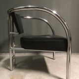 A pair of petite low armchairs by ronald cecil sportes for lumen center, 1987