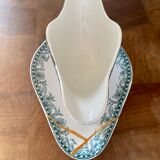 Ancienne saucière réparée avec la technique japonaise du kintsugi