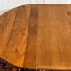 Round cherry wood table, 6 feet, Louis Philippe style with 2 extensions.
