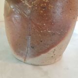 Pitcher in varnished sandstone