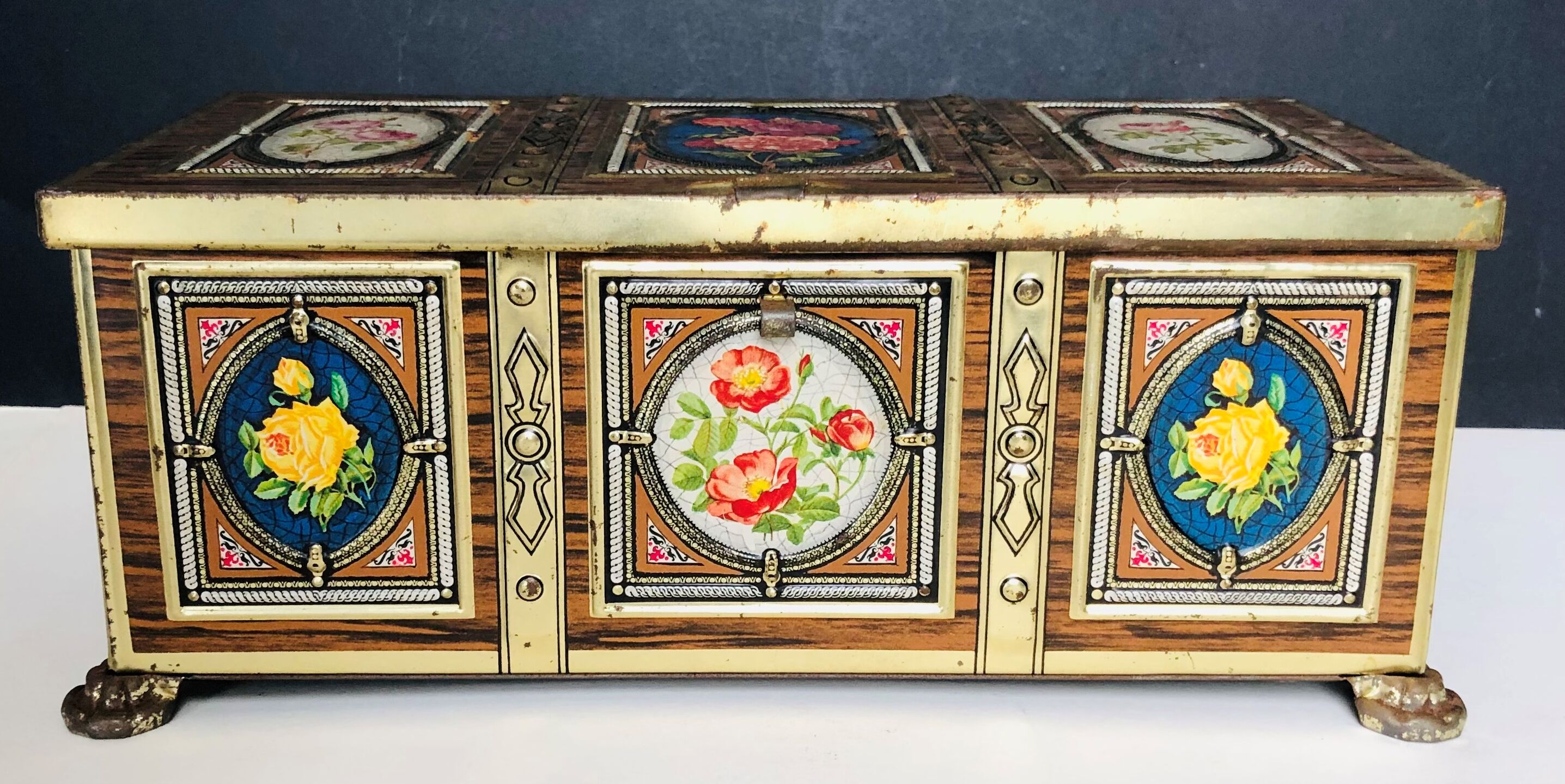 Old metal box decorated with flowers