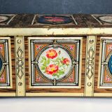 Old metal box decorated with flowers